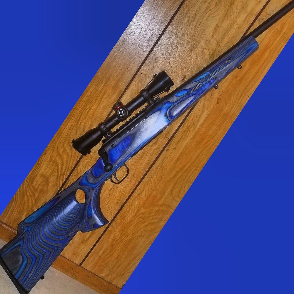 Boyds Hardwood Gunstocks - Featherweight Thumbhole Laminate in Sky Blue on a Savage Axis Rifle. - Outdoor Gear Near Me - Mitchell, South Dakota Boyds Hardwood Gunstocks - Featherweight Thumbhole Laminate in Sky Blue on a Savage Axis Rifle. - Outdoor Gear Near Me - Mitchell, South Dakota