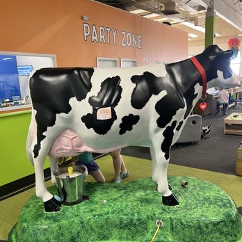 Explorium - Milk the cow - Children's Museums Near Me - Denton, Texas