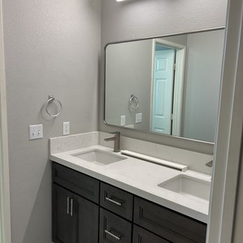 CASA Renovations, INC. - Guest bathroom new counter, mirror, sink, light to match owner suite. - Flooring Near Me - Riverside, California CASA Renovations, INC. - Guest bathroom new counter, mirror, sink, light to match owner suite. - Flooring Near Me - Riverside, California