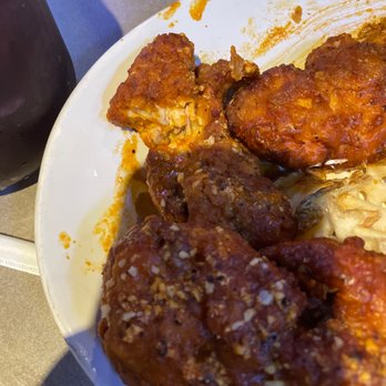 Pluckers Wing Bar - Plano - Boneless wings. Food came out cold with what either looks like a bite already taken out of it. Which was hiding under the third wing. - Chicken Wings Near Me - Plano, Texas