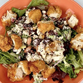 SaugaTaco - Broccoli Salad- with broccoli cauliflower, cherries, apple, beans, goat cheese and a poppyseed dressing topped with crispy chicken - Tacos Near Me - Saugatuck, Michigan SaugaTaco - Broccoli Salad- with broccoli cauliflower, cherries, apple, beans, goat cheese and a poppyseed dressing topped with crispy chicken - Tacos Near Me - Saugatuck, Michigan