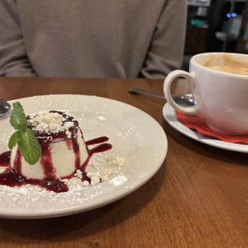 Peyrassol West - Panna cotta with berry sauce and crispy meringue topping - Italian Near Me - Normandy Park, Washington