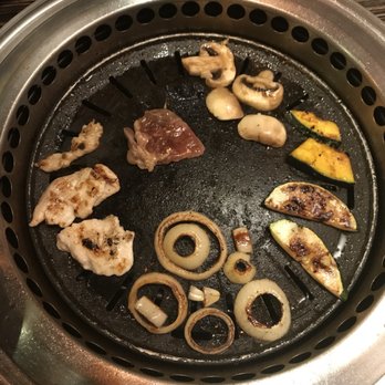 Takumi Restaurant - Grilling away! - Sushi Bars Near Me - Albuquerque, New Mexico