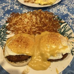 Crab cake benedict and crispy hash browns. Crab cake benedict and crispy hash browns.