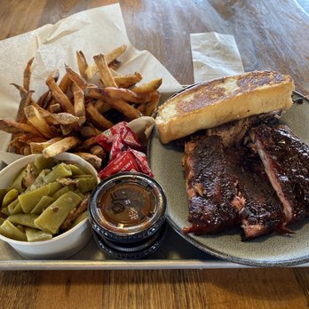 City Barbeque - Ribs and brisket (under the Texas toast) with sides Basket of Fresh-Cut Fries and Green Beans with Bacon. - Barbeque Near Me - Indianapolis, Indiana City Barbeque - Ribs and brisket (under the Texas toast) with sides Basket of Fresh-Cut Fries and Green Beans with Bacon. - Barbeque Near Me - Indianapolis, Indiana