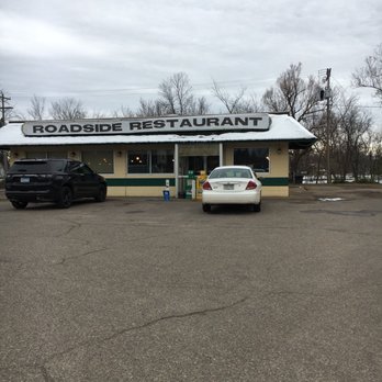 Roadside Restaurants - a car parked in front of a restaurant - Diners Near Me - Aitkin, Minnesota