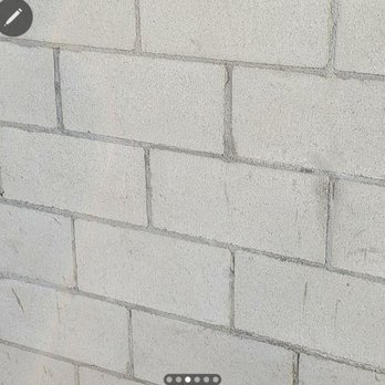 Mr Fix It - a brick wall being built - Painters Near Me