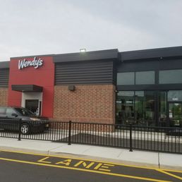a car parked in front of a restaurant