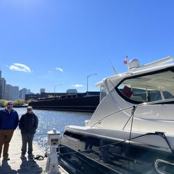 Bad Dog Marine Services - Captain Jon & David on the Chicago River in River North