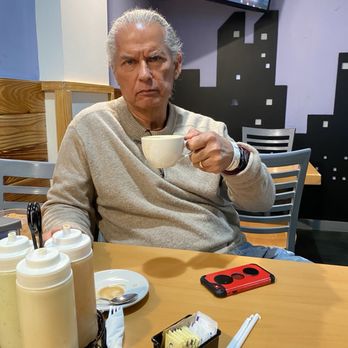 Nico's Arepas Grill - Hubby having a cafe con leche - Venezuelan Near Me - Tampa, Florida