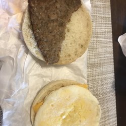 Dunkin' - English muffin, sausage and cheese.. English muffin not toasted and half a sausage for full price..