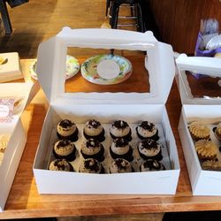 Heirloom Bakery and Kitchen - Chocolate cake with cookies and cream frosting Carrot cake with cream cheese frosting