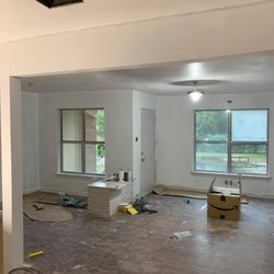 Withers Renovations - Four rooms into one big room.