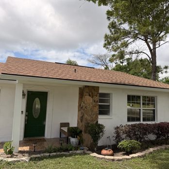Elevate Seamless Gutters - The front entrance of the home after the gutter installation. - Gutter Services Near Me - Kissimmee, Florida Elevate Seamless Gutters - The front entrance of the home after the gutter installation. - Gutter Services Near Me - Kissimmee, Florida