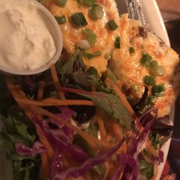 Potato skins. More like baked potato with melted cheese.