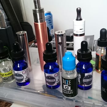Vape Stop - My mods, and the blue bottles... Mobster juice.. Go into VAPE STOP and pick some up - Vape Shops Near Me - Bullhead City, Arizona Vape Stop - My mods, and the blue bottles... Mobster juice.. Go into VAPE STOP and pick some up - Vape Shops Near Me - Bullhead City, Arizona