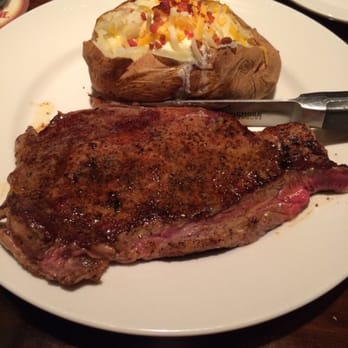 LongHorn Steakhouse - Ribeye steak and loaded baked potato - Steakhouses Near Me - Daphne, Alabama