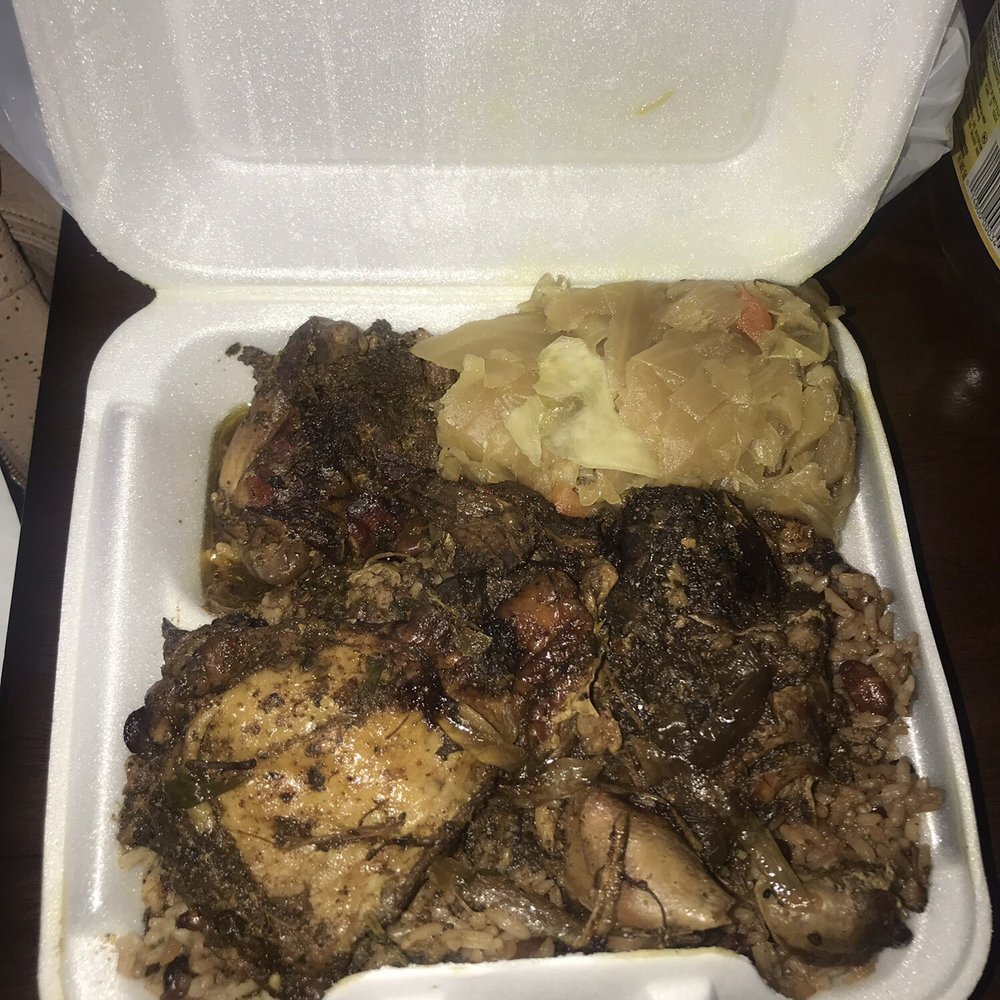 Jerk chicken (with stew chicken gravy), cabbage and rice & peas... very spicy!! But not bad. Jerk chicken (with stew chicken gravy), cabbage and rice & peas... very spicy!! But not bad.