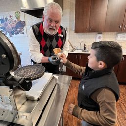 These amazing guy explained the waffle cone process to my son :) These amazing guy explained the waffle cone process to my son :)