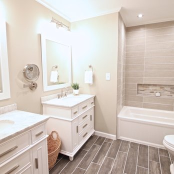 ReStart Home Renovations - a bathroom with a tub, toilet, and sink - General Contractors Near Me - Easton, Pennsylvania ReStart Home Renovations - a bathroom with a tub, toilet, and sink - General Contractors Near Me - Easton, Pennsylvania