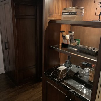 Surety Hotel, Autograph Collection - Cool built-in closet, shelving, and fridge in a King Guestroom (room type K1) - Hotels Near Me - Des Moines, Iowa