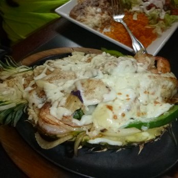 Mi Cancun - Shrimp dish served in a real pineapple. - Mexican Near Me - Morrisville, North Carolina