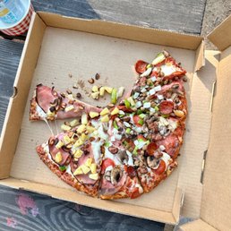 Large traditional crust half Hawaiian (with roasted cashews!) and half combo (no black olives). Delish! Large traditional crust half Hawaiian (with roasted cashews!) and half combo (no black olives). Delish!