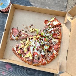 Miner Moe's Pizza - Large traditional crust half Hawaiian (with roasted cashews!) and half combo (no black olives). Delish!
