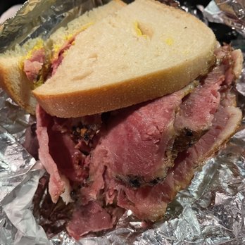 Gerry's Delicatessen - a roast beef sandwich on a piece of tin foil - Delis Near Me - Montreal, Quebec Gerry's Delicatessen - a roast beef sandwich on a piece of tin foil - Delis Near Me - Montreal, Quebec