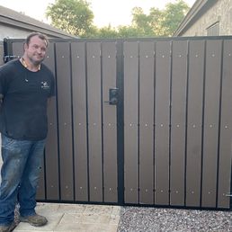 Ryan of RS Fence and our new gates. Ryan of RS Fence and our new gates.