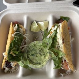 Two veggie hard shell tacos.