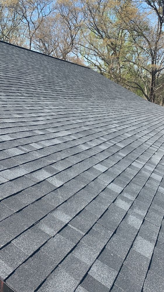 Slide of E. Thompson Roofing