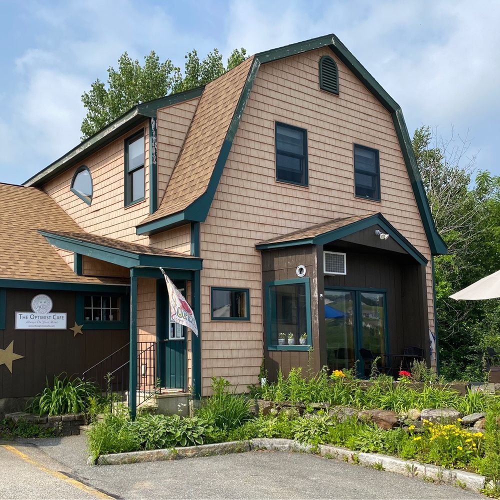 The cafe is on the right and is attached to an indoor New England Goods shopping "consortium". The cafe is on the right and is attached to an indoor New England Goods shopping "consortium".