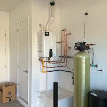 Talbot Plumbing Services - Tankless water heater perks:Endless hot water, space saving compact size, longer service life, energy efficient,and environmentally friendly - Water Purification Services Near Me