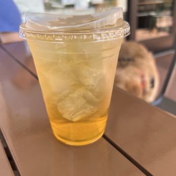 Coffee Bandits - Iced Green Tea with Mango Syrup - Coffee & Tea Near Me - Merced, California Coffee Bandits - Iced Green Tea with Mango Syrup - Coffee & Tea Near Me - Merced, California