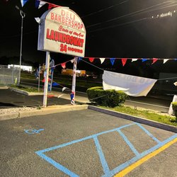 State Of the Art Laundromat - West Babylon - nice n clean handicap sign parking spot at our front of store