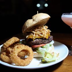 TroutHunter - Last Chance Bar & Grill - Hickory Burger - Smoked barbecue sauce, bacon, onion straws and cheddar cheese on a Kaiser roll - $15