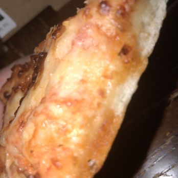Pizza Time - a hand holding a piece of pizza - Pizza Near Me - Spanaway, Washington Pizza Time - a hand holding a piece of pizza - Pizza Near Me - Spanaway, Washington
