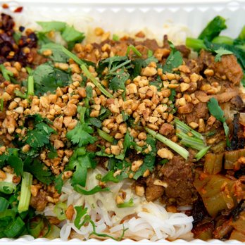 Burmese Bites - Shan Kaukswe: $8.95. Take-out. Rice noodles and a blend of chicken, pickled mustard greens, peanuts, chili, scallions, snow pea leaves. - Burmese Near Me - Elmhurst, New York