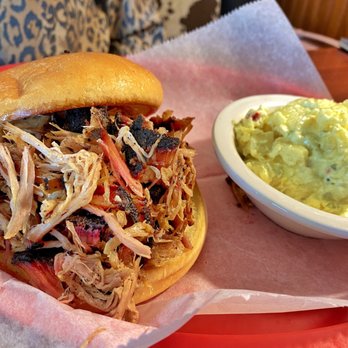 HalfSauced Barbeque - Pulled Pork sandwich with picnic potato salad. Side was awesome as well and had a mustard taste. - Barbeque Near Me - Osage Beach, Missouri HalfSauced Barbeque - Pulled Pork sandwich with picnic potato salad. Side was awesome as well and had a mustard taste. - Barbeque Near Me - Osage Beach, Missouri