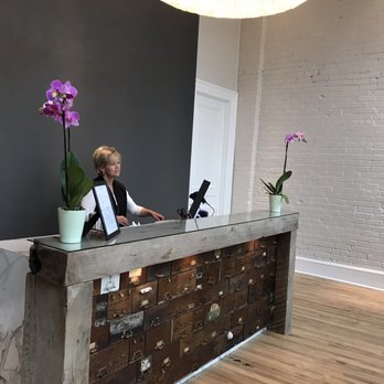 The Harkness Salon & Spa - The owner repurposed the original mailboxes from the post office which used to occupy this location to create this stunning reception desk. - Hair Salons Near Me - McCammon, Idaho The Harkness Salon & Spa - The owner repurposed the original mailboxes from the post office which used to occupy this location to create this stunning reception desk. - Hair Salons Near Me - McCammon, Idaho