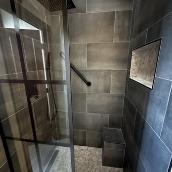 Extra Mile Builders - New tile shower with niche and mosaic floor with side drain - General Contractors Near Me