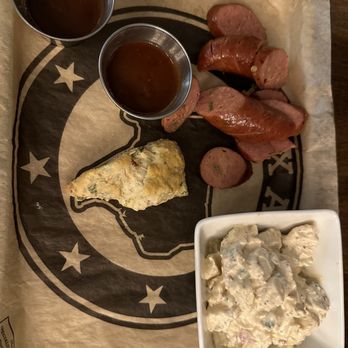 Whiskey & Smoke - Quarter pound Texas waygu sausage w/ red skinned potato salad - Whiskey Bars Near Me - Flower Mound, Texas