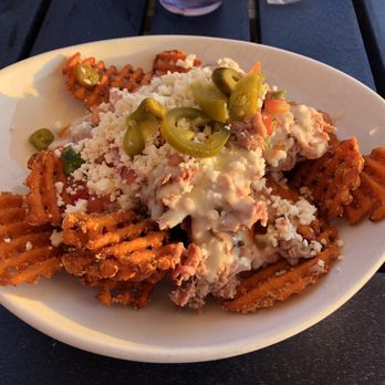 NC Coast Grill & Bar - Sweet potato Mexican poutine nachos - New American Near Me - Kitty Hawk, North Carolina NC Coast Grill & Bar - Sweet potato Mexican poutine nachos - New American Near Me - Kitty Hawk, North Carolina