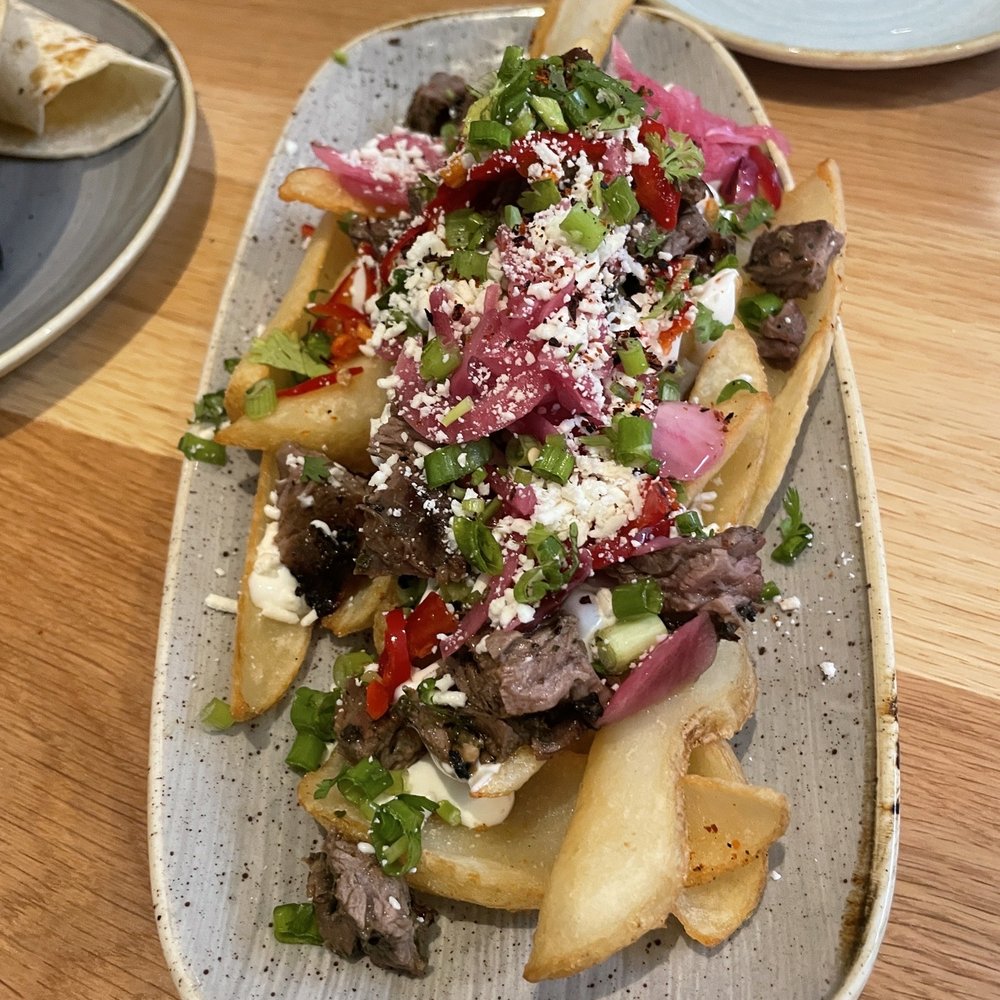 Lady Nomada - Mexican Kitchen - Carne Asada Fries - Mexican Near Me - Arvada, Colorado Lady Nomada - Mexican Kitchen - Carne Asada Fries - Mexican Near Me - Arvada, Colorado