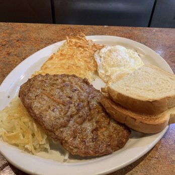 The Satellite Diner - Hash browns, 2 eggs, sausage patty w/ sour dough toast. - Breakfast & Brunch Near Me - Spokane, Washington The Satellite Diner - Hash browns, 2 eggs, sausage patty w/ sour dough toast. - Breakfast & Brunch Near Me - Spokane, Washington