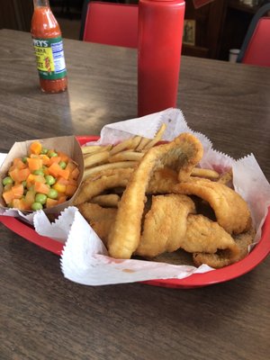 Photo of Mom's Cafe & Catering - Plattsmouth, NE, US. Walleye, fries and vegetables with rye bread.