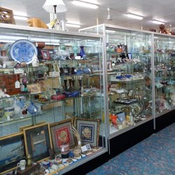 Westfield Village Antique Center - Much of the glass is beautifully displayed in glass cases.