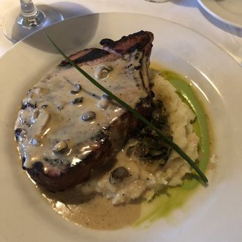 Mimi's Table - Brined & Smoked Pork Chop with collards and mashed potatoes was excellent. - Italian Near Me - Tallahassee, Florida Mimi's Table - Brined & Smoked Pork Chop with collards and mashed potatoes was excellent. - Italian Near Me - Tallahassee, Florida