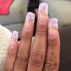 New Nails - After 4 weeks I'm finally able to start taking them off, she did such a great job that it's still sealed at  the bottom